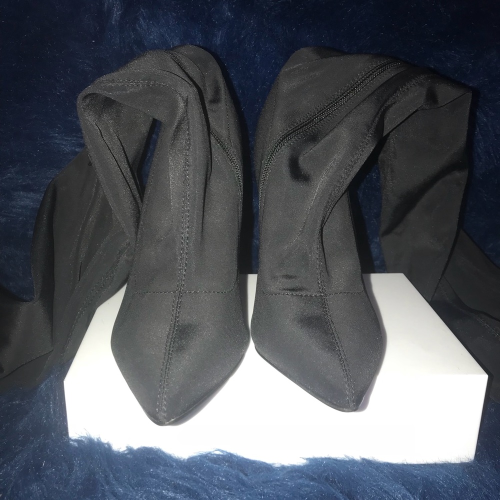 Over the knee high heel boots